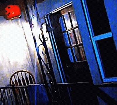 Room With Blue Door And Chair GIF