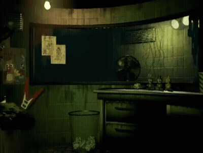 Room With Bulletin Board and Trash Can