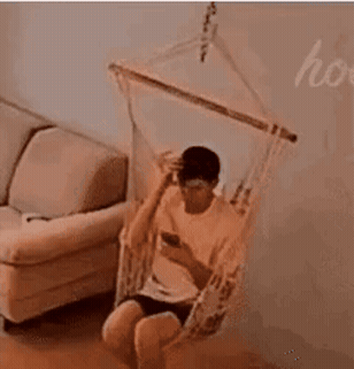 Room With Couch And Hanging Emojis GIF