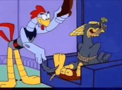 Rooster Standing Next To Chicken Tied Up In Box GIF