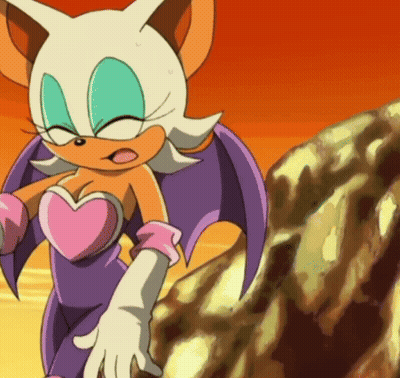 Rouge The Bat Standing In Front Of A Rock GIF