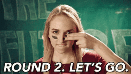Round 2 Woman Putting Mark On Face GIF