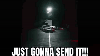 Row Of Cars Parked In Dark Lot GIF