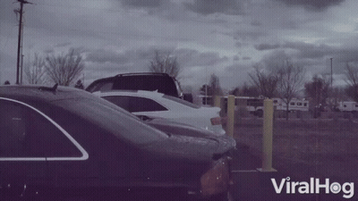 Row Of Cars Parked In Parking Lot Viralhog GIF