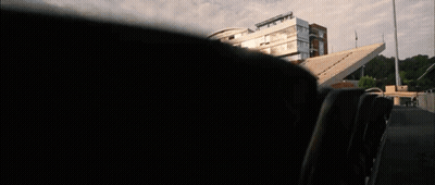 Row Of Empty Seats In Front Of Building GIF