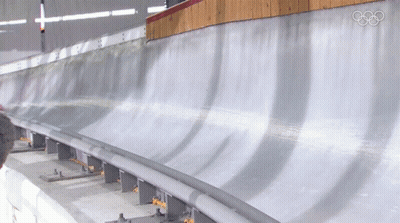Row Of Empty Seats With Olympic Rings GIF