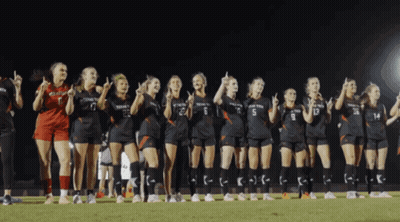 Row of Female Soccer Players in Texas Tech Jerseys