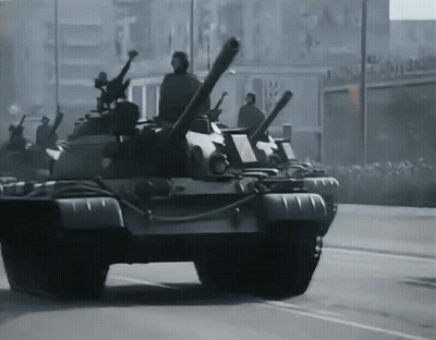 Row Of Military Tanks In Black And White GIF