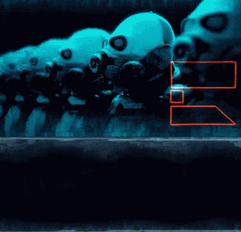 Row Of Robots Wearing Gas Masks With Letter B GIF