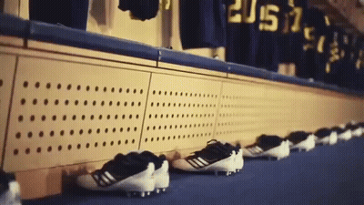 Row Of Soccer Cleats Lined Up With 2015 Jerseys GIF