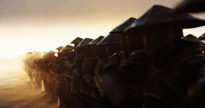Row Of Soldiers In Conical Hats Walking GIF