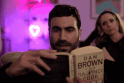 Roy Kent Ted Lasso Mind Blown Reading Dan Brown GIF