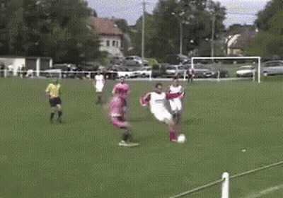 Rugby Player Running While Being Tackled GIF
