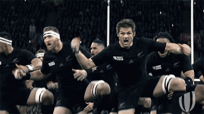 Rugby Players In Black Uniforms Saying All Black GIF