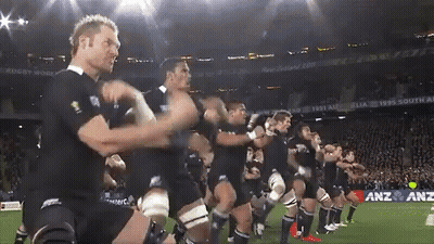 Rugby Players Performing Haka On Field With ANZ GIF