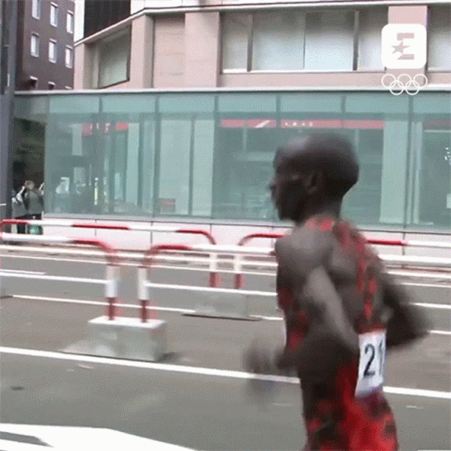 Runner Number 21 Running Down Street GIF