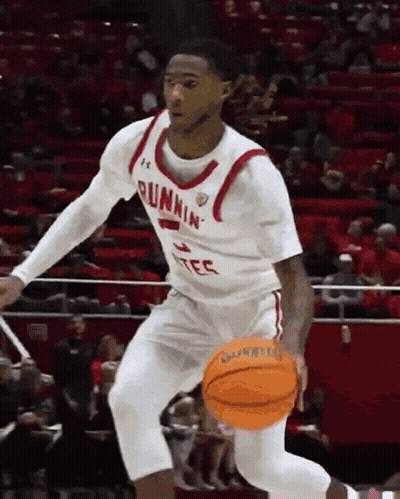 Runnin' Utes Basketball Player Dribbling GIF