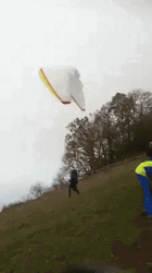 Running Down A Cliff For Paragliding GIF