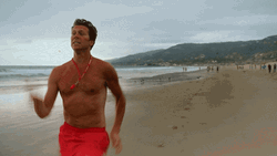 Running Fast Life Guard On Beach GIF