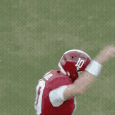Running Football Player In Red Uniform And Helmet GIF