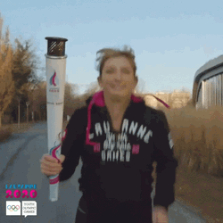 Running With Olympic Torch GIF