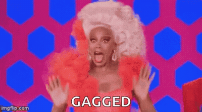 Rupaul In Red Dress And White Wig Saying Gagged GIF