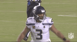 Russell Wilson Spreading Arms GIF