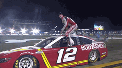 Ryan Blaney Standing On His Car GIF
