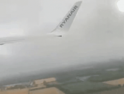 Ryanair Airplane Flying In Fog GIF