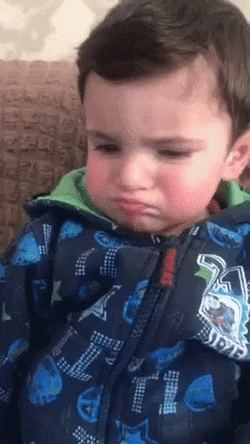 Sad Boy Pouting And Looking Down GIF