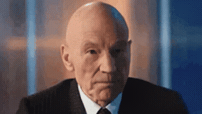 Sad Cartoon Character In Front Of Alien Crowd GIF