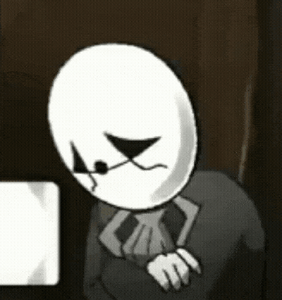 Sad Cartoon Character Sitting At Computer GIF
