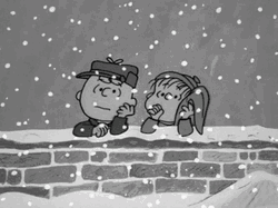 Sad Charlie Brown Watching Blizzard GIF