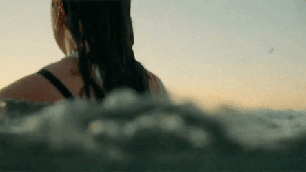 Sad Girl Feeling Emotions In Ocean Waves GIF