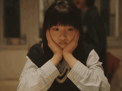 Sad Girl With Hands On Face GIF