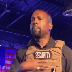 Sad Kanye Wearing Security Vest GIF