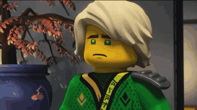 Sad Lego Character Standing In Front Of Potted Plant GIF