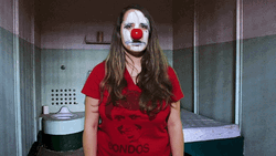 Sad Woman Clown In Jail GIF