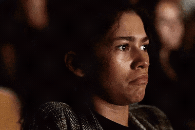 Sad Woman Sitting Dark Room Eyes Closed GIF