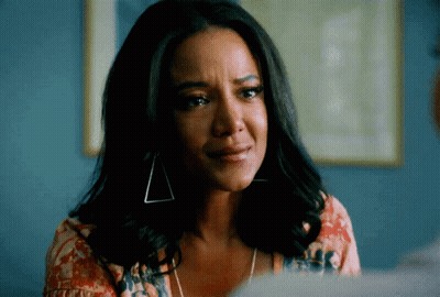 Sad Woman Wearing Earrings GIF