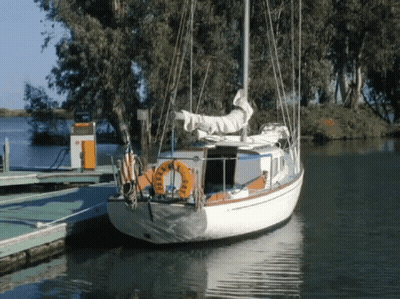 Sailboat Docked With Life Preserver GIF