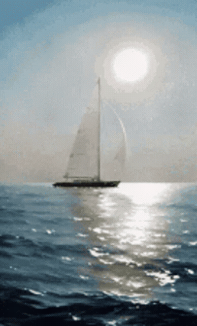 Sailboat In Ocean With Bright Sun GIF