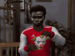 Saka Wearing Clown Mask GIF