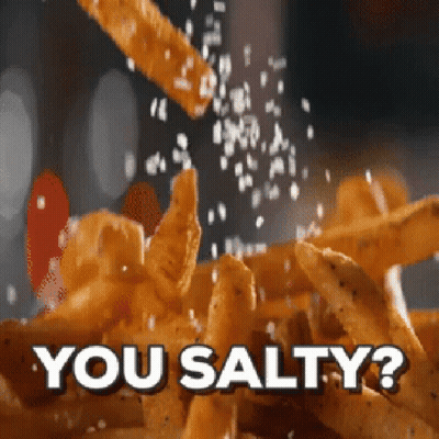 Salt Is Being Poured On A Pile Of French Fries With The Words You Salty Written Below It GIF