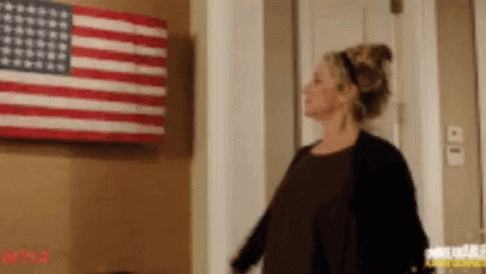 Saluting American Flag Waving GIF