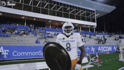 San Jose State Football Player Holding Black Shield