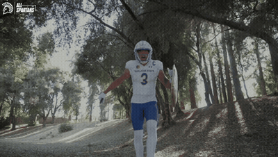 San Jose State Spartans Football Player Running Through Woods GIF