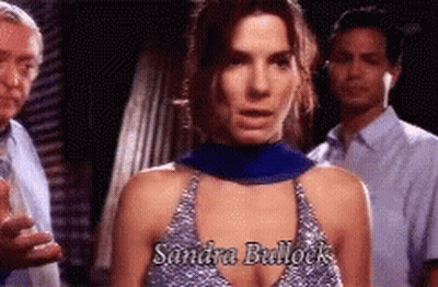 Sandra Bullock Standing In Front Of Two Men GIF