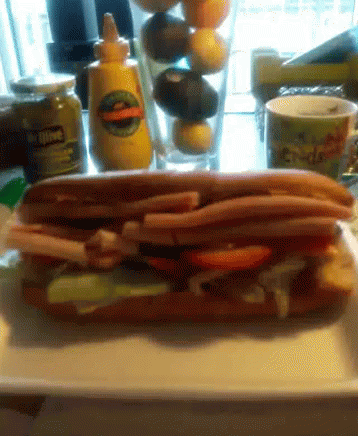 Sandwich On A Plate With Mustard Bottle GIF