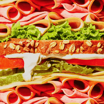 Sandwich Surrounded By Ham Slices GIF